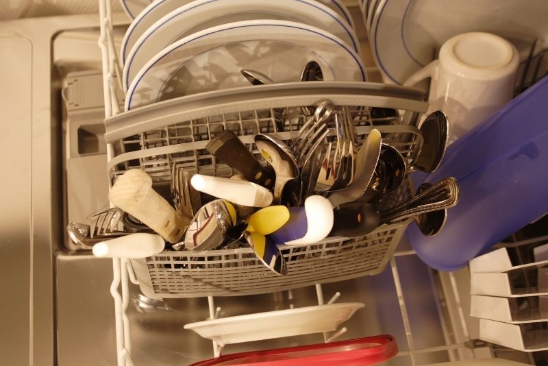 Dishwasher being cleaned